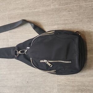 NWOT Black nylon cross body with multiple pockets